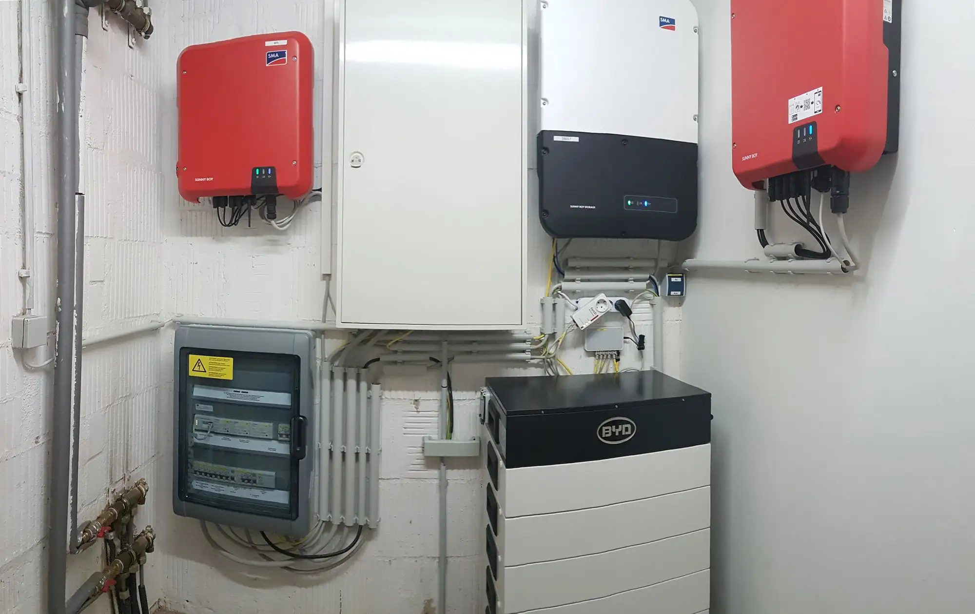 Hybrid inverter and battery storage mounted in a garage