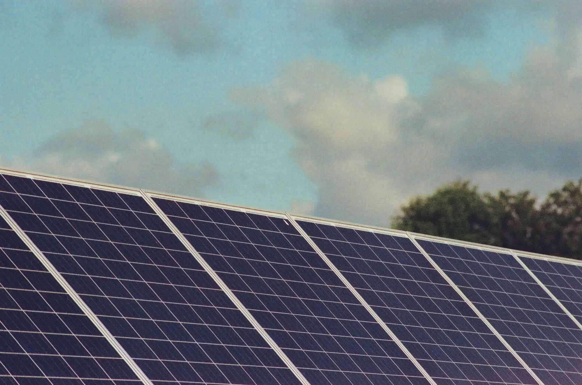 Close-up of solar panels under a clear sky