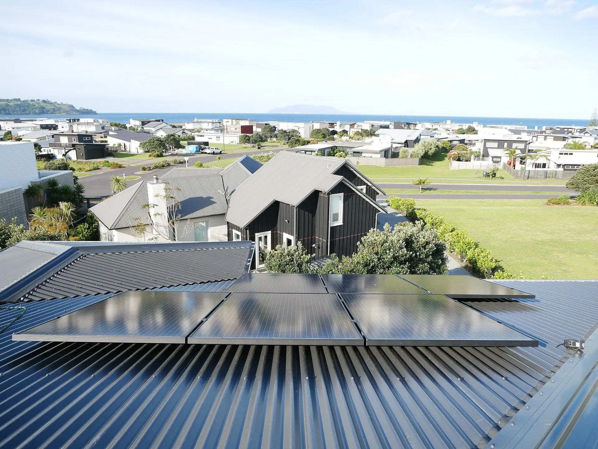 Solar panels on the corrugated roof of a New Zealand home