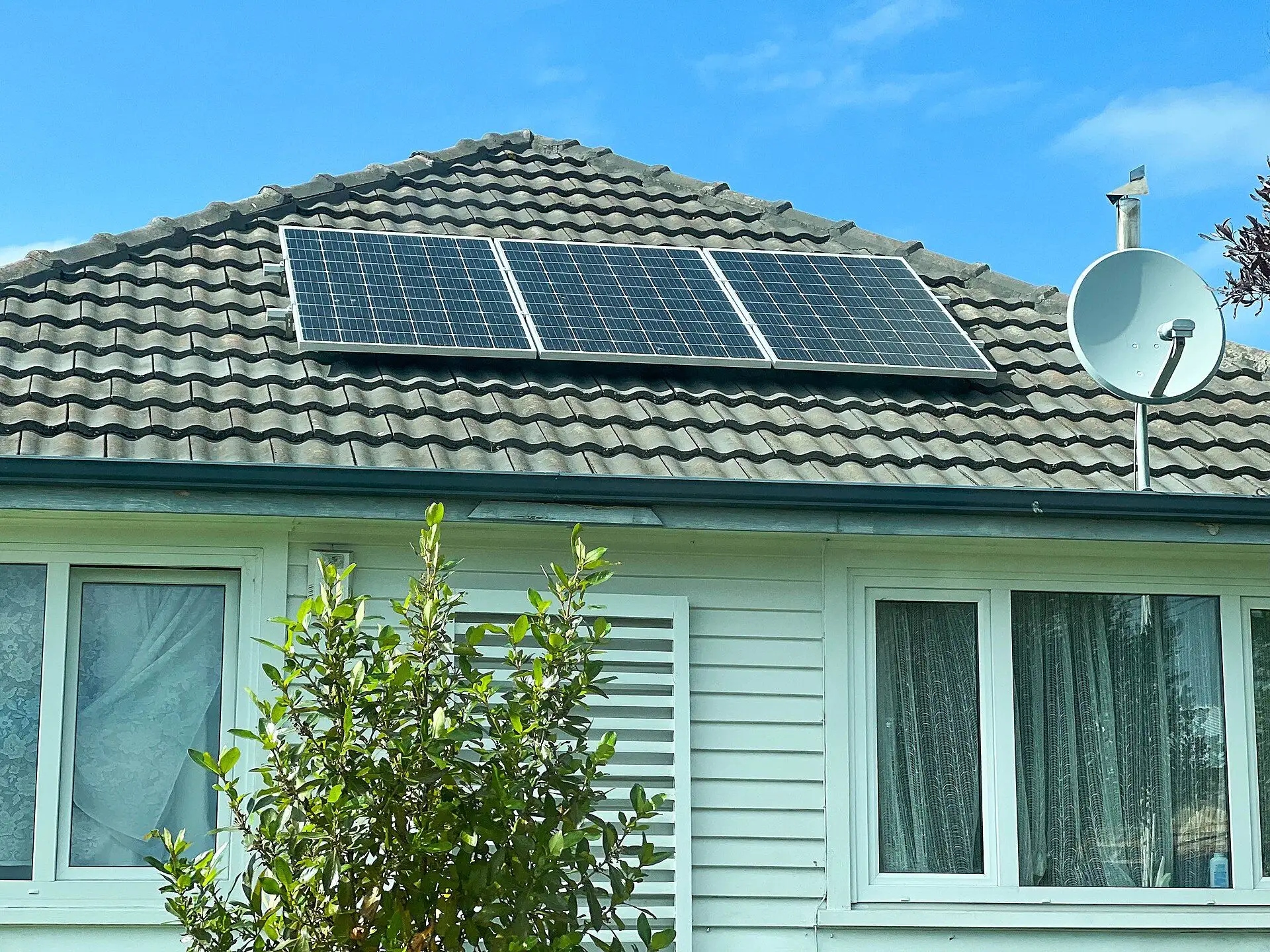 Solar panels on a New Zealand weatherboard house