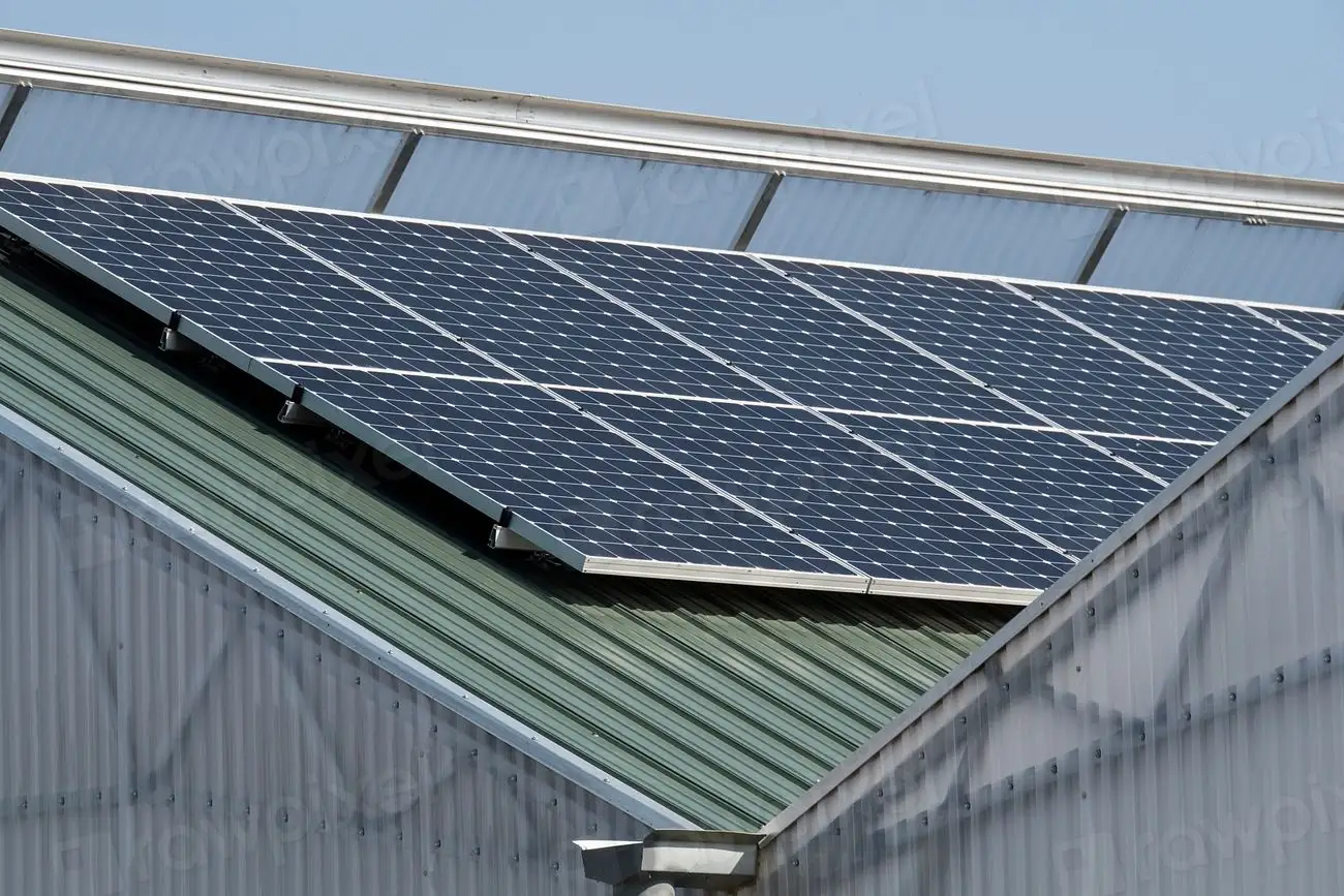Solar panels on the roof of a farm shed